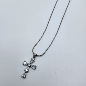 VERY pretty Cross with Rhinestones AND a quartz in the center.  Sterling silver
